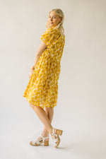 The Burwell Tiered Midi Dress in Mustard Floral