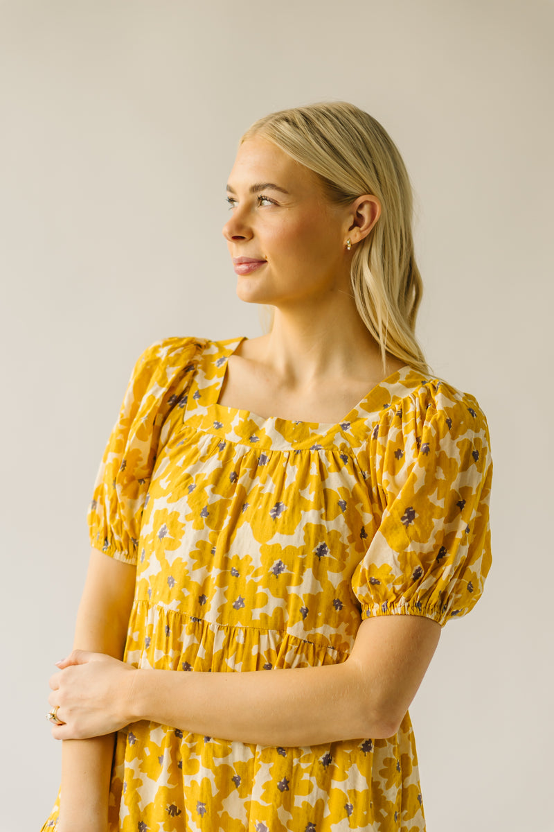 The Burwell Tiered Midi Dress in Mustard Floral
