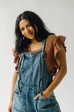 The Traskwood Stone Washed Jumpsuit in Washed Denim