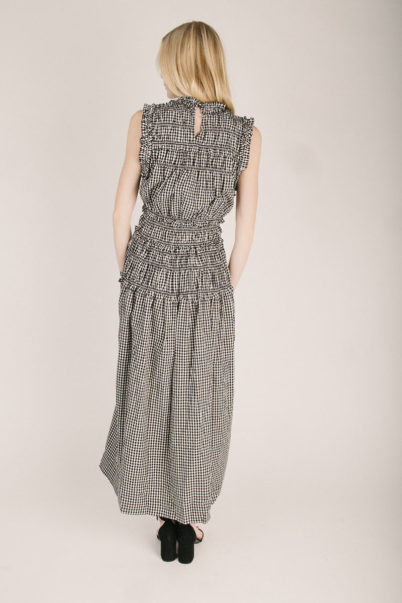 The Blackner Smocked Gingham Maxi Dress in Black