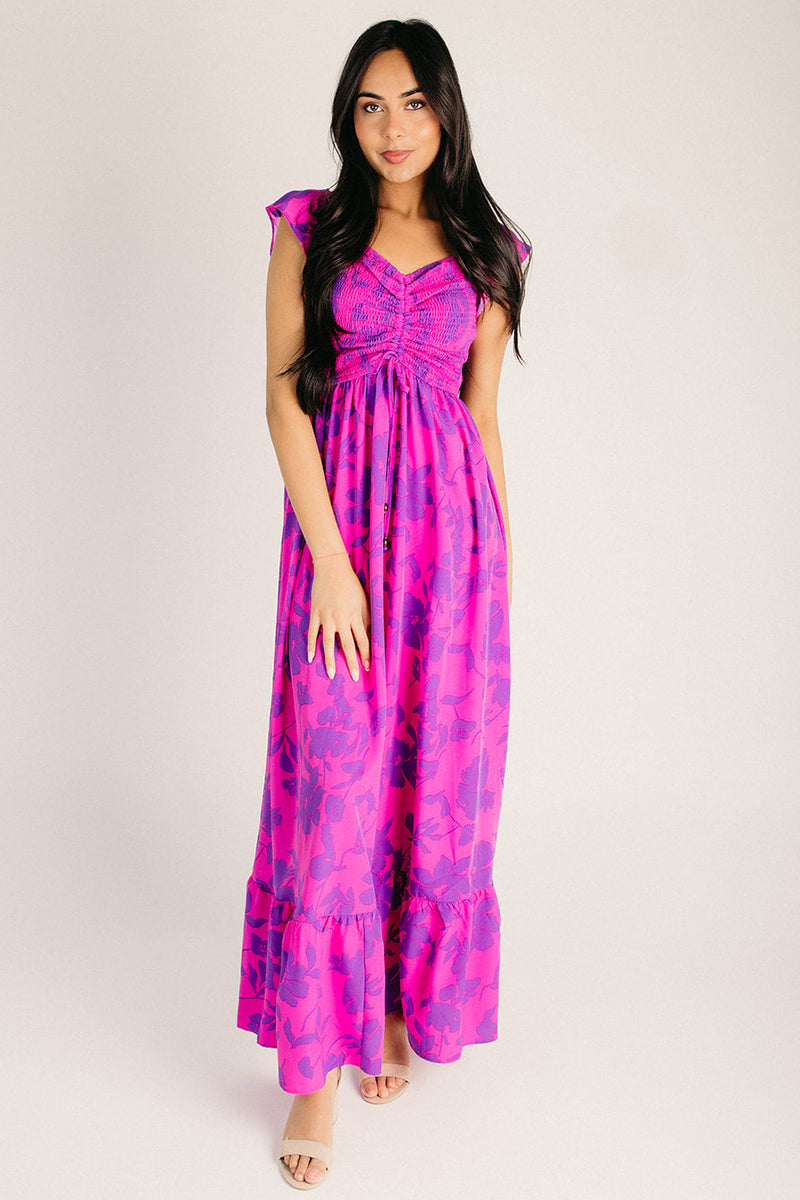 The Jocelyn Off-The-Shoulder Maxi Dress in Magenta Floral Piper & Scoot The Jocelyn Off-The-Shoulder Maxi Dress in Magenta Floral Piper & Scoot