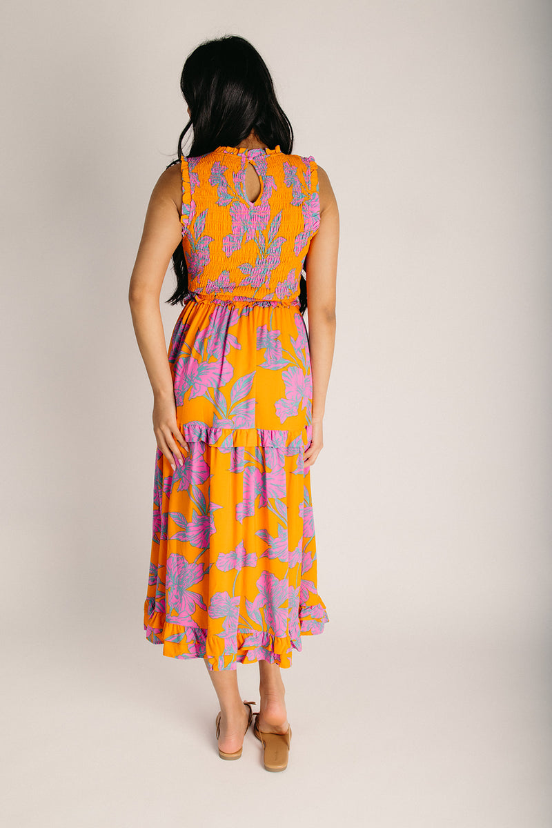 The Kathia Smocked Floral Midi Dress in Orange + Pink Small