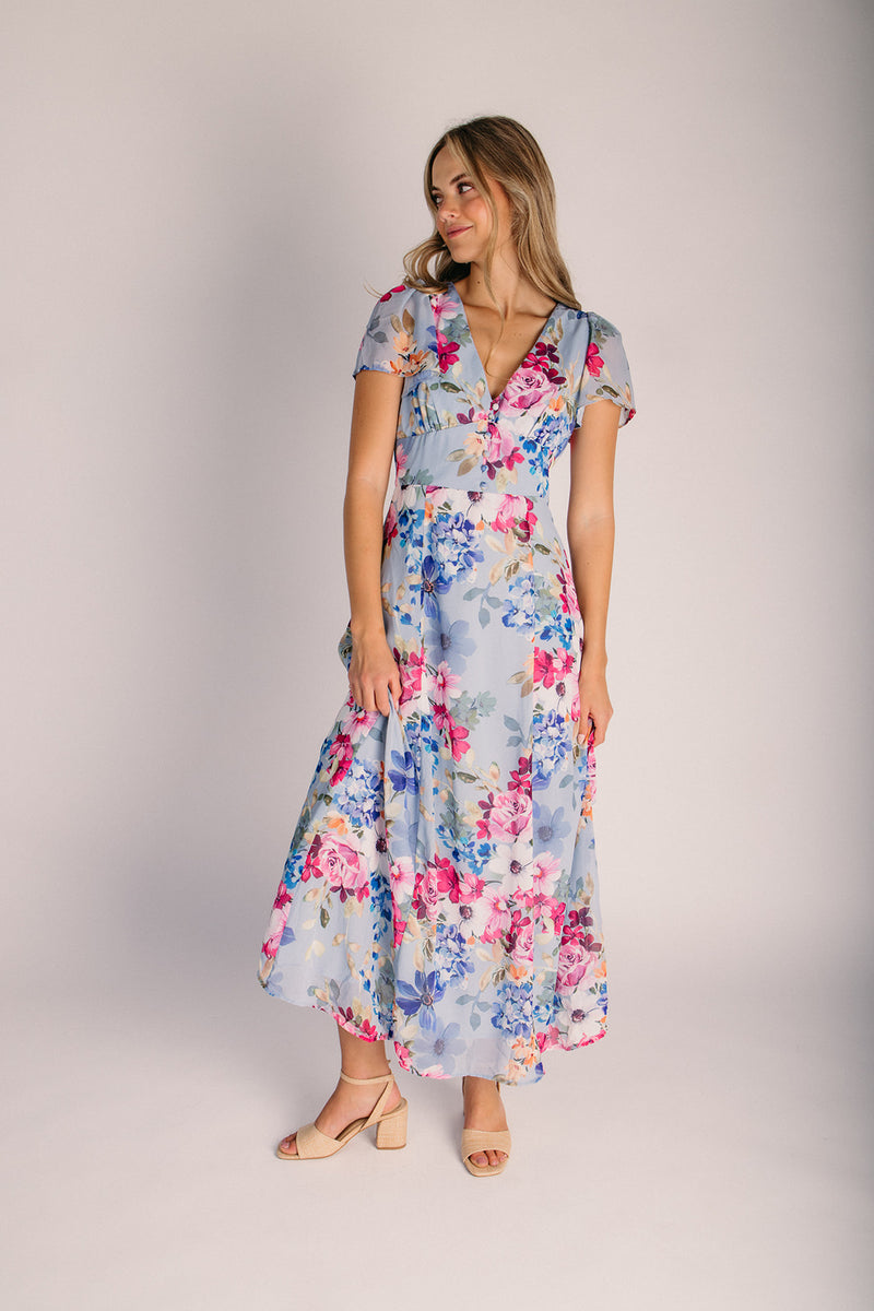 The Camille V-Neck Flutter Sleeve Maxi Dress in Blue Floral Small The Camille V-Neck Flutter Sleeve Maxi Dress in Blue Floral Small