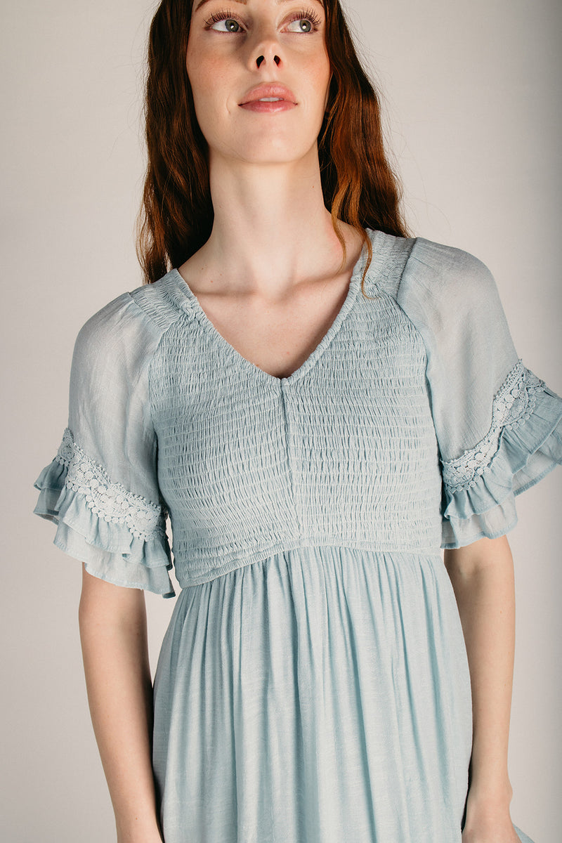 The Hannah Smocked Midi Dress in Light Blue  Piper & Scoot