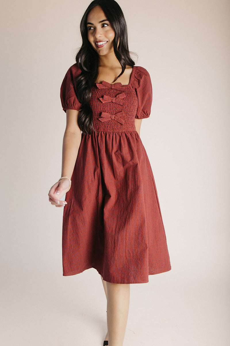 The Pavia Bow Detail Gingham Dress in Brick + Navy Piper & Scoot The Pavia Bow Detail Gingham Dress in Brick + Navy Piper & Scoot