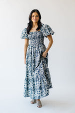 The Seaberg Smocked Midi Dress in Navy Floral