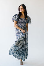 The Seaberg Smocked Midi Dress in Navy Floral