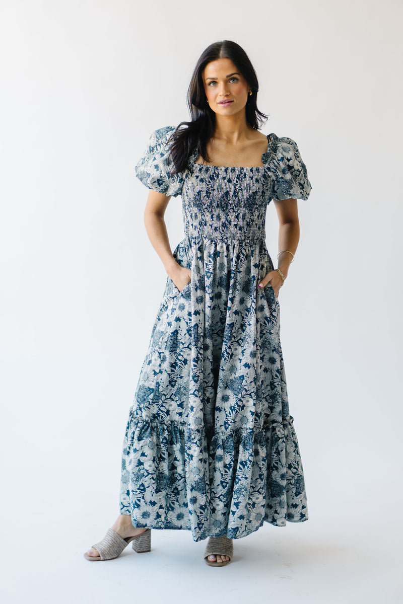 The Seaberg Smocked Midi Dress in Navy Floral