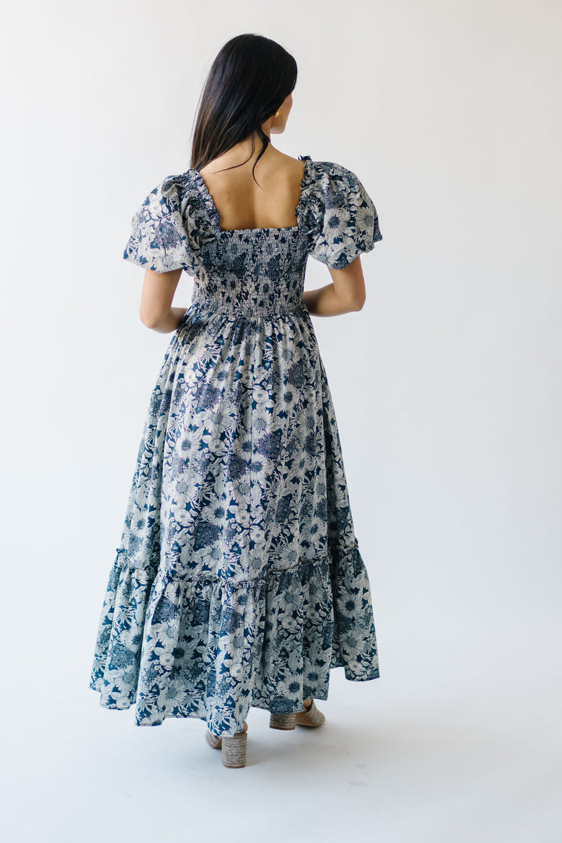 The Seaberg Smocked Midi Dress in Navy Floral