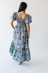 The Seaberg Smocked Midi Dress in Navy Floral