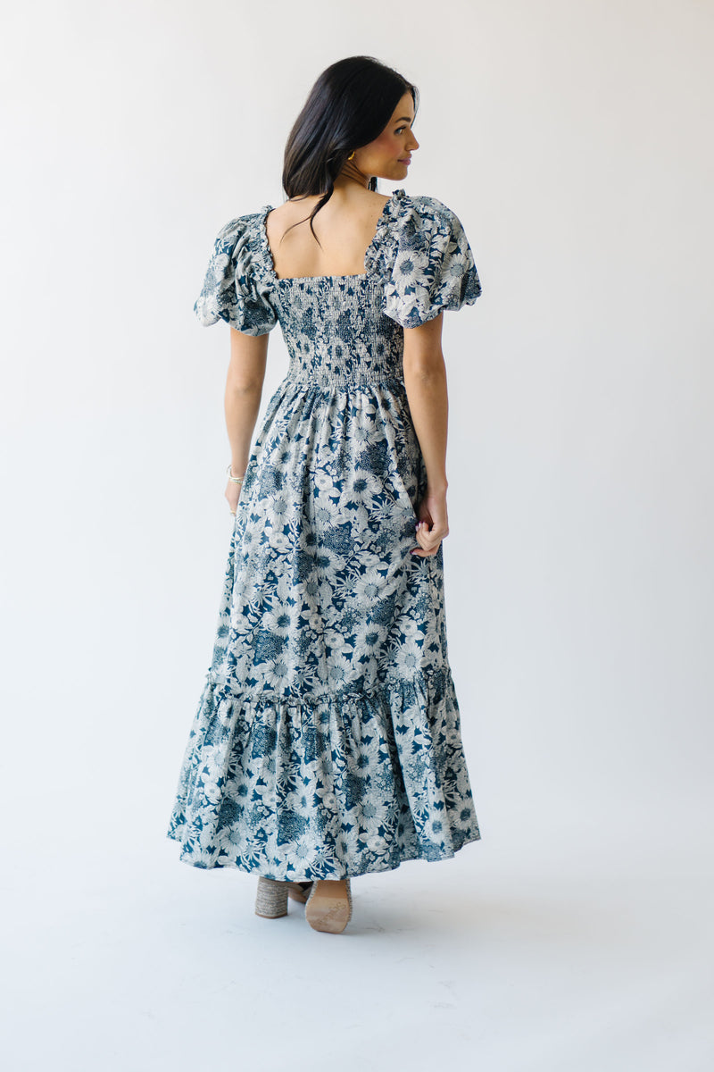 The Seaberg Smocked Midi Dress in Navy Floral