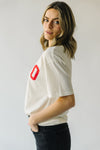 The Hugs + Kisses Graphic Tee in Cream