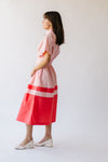 The Pierson Colorblock Pleated Midi Dress in Pink + Red