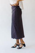 The Danzy Checkered Midi Skirt in Purple