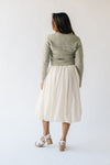 The Malson Crinkle Midi Skirt in Cream