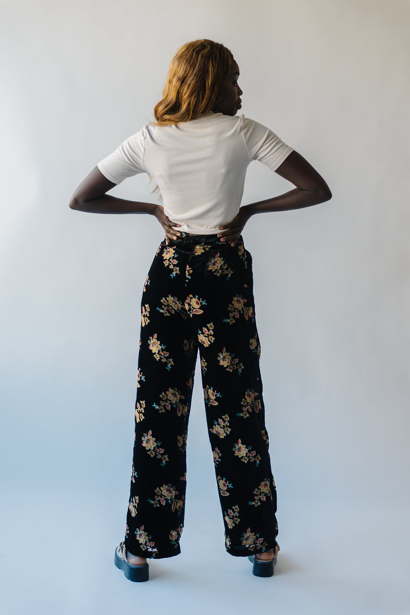Trousers with flower print - Black | Benetton