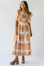 The Komen Patterned Midi Dress in Cream