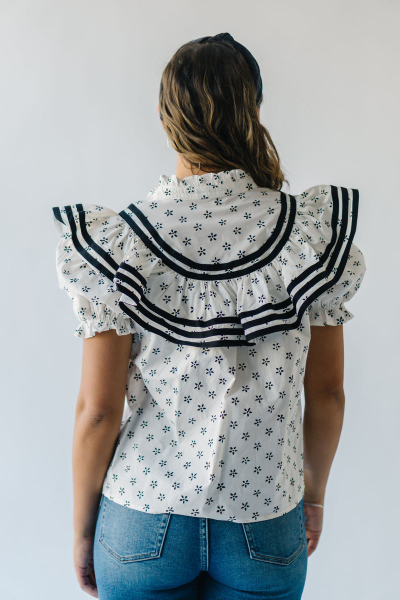 The Swanston Ruffle Detail Floral Blouse in White