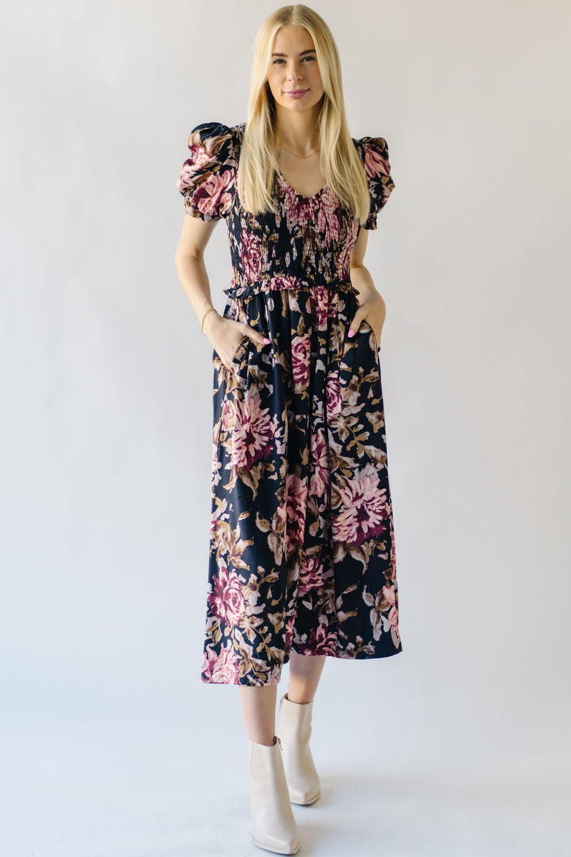 The Pamrick Smocked Floral Midi Dress in Black