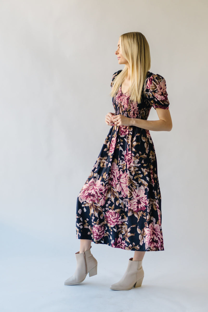 The Pamrick Smocked Floral Midi Dress in Black