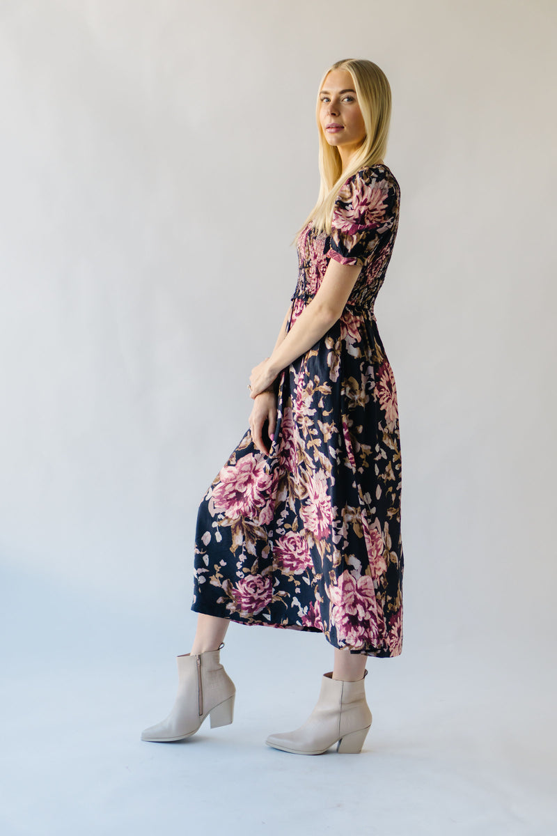 The Pamrick Smocked Floral Midi Dress in Black