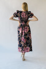 The Pamrick Smocked Floral Midi Dress in Black