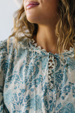 The Harward Floral Puff Sleeve Blouse in Sapphire Blue