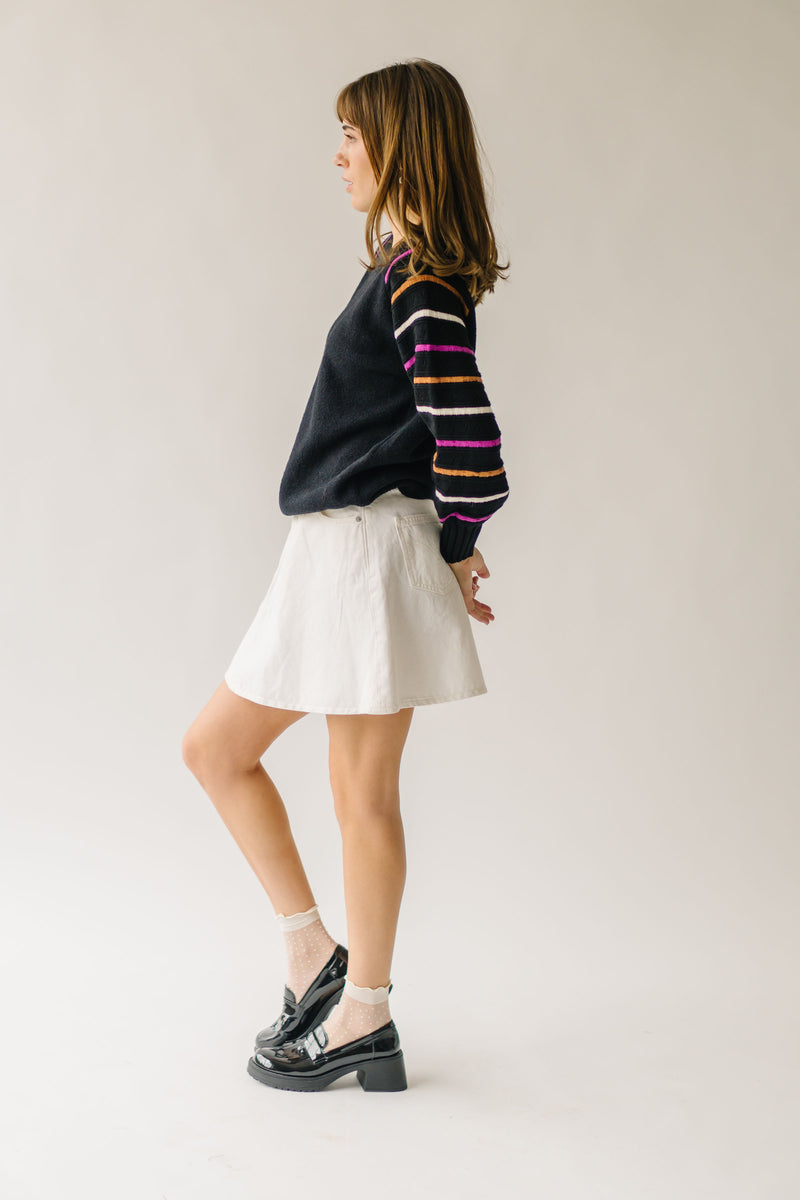 The Dalhart Striped Sleeve Sweater in Black