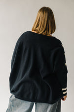 The Donakey Batwing Striped Sweater in Black + Ivory