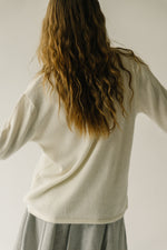 The Tindle Mock Neck Sweater in Cream