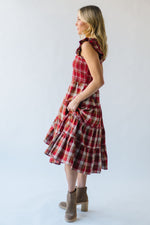 The Berglin Plaid Smocked Midi Dress in Cognac + Red