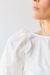 The Vaela Pearl Detail Blouse in Off White