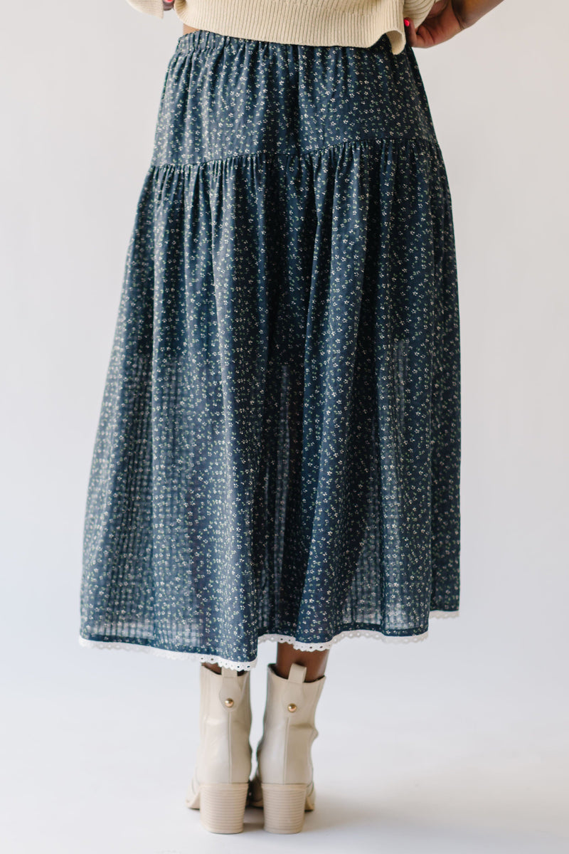 The Axelson Floral Printed Midi Skirt in Charcoal