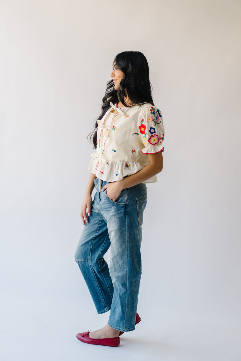 The Maura Embroidered Tie Front Blouse in Cream