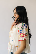 The Maura Embroidered Tie Front Blouse in Cream