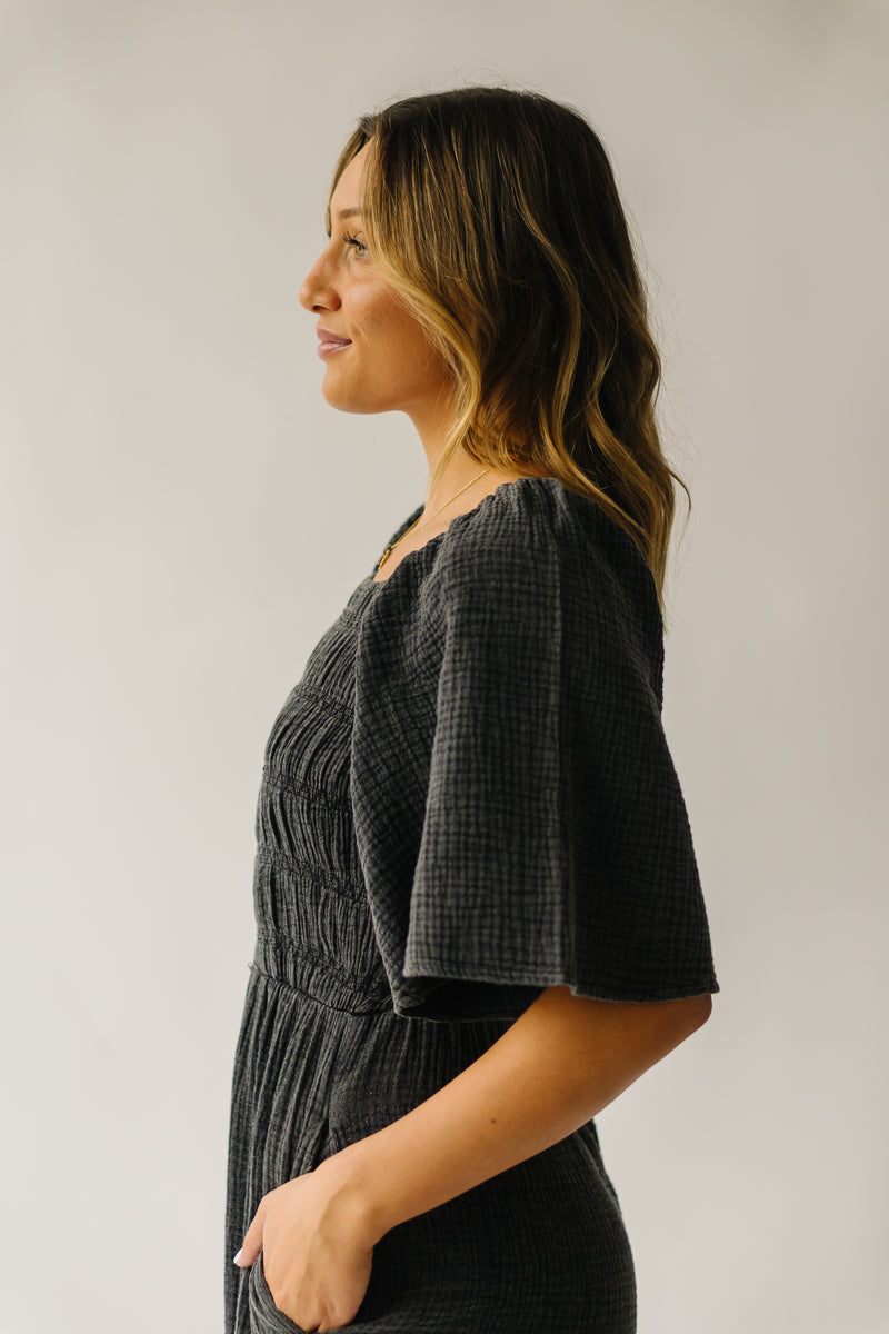 The Slater Smocked Detail Jumpsuit in Washed Charcoal