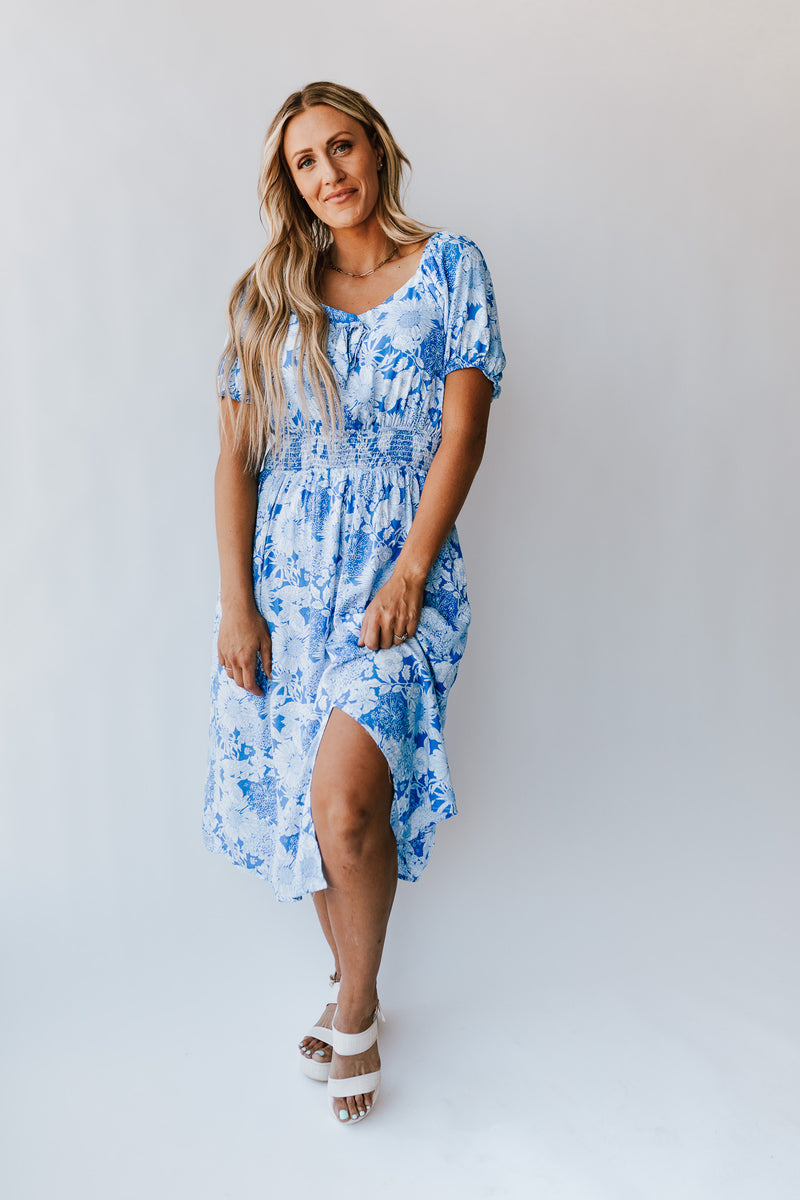 The Challis Smocked Detail Dress in Blue Floral