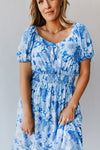 The Challis Smocked Detail Dress in Blue Floral
