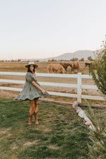 The Tannis Puff Sleeve Gingham Dress in Olive + Ivory