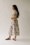 The Zembala Patterned Puff Sleeve Midi Dress in Black + Cream