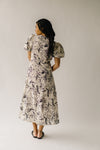 The Zembala Patterned Puff Sleeve Midi Dress in Black + Cream