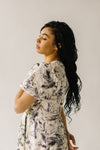 The Zembala Patterned Puff Sleeve Midi Dress in Black + Cream