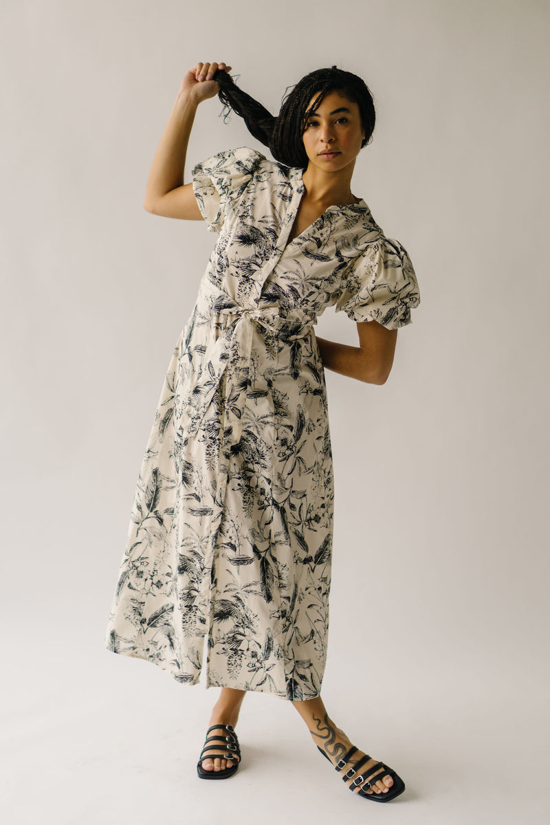 The Zembala Patterned Puff Sleeve Midi Dress in Black + Cream
