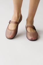 Melissa: The Soft Ballerina Sandal in Clear Brown