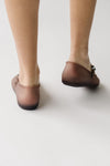 Melissa: The Soft Ballerina Sandal in Clear Brown