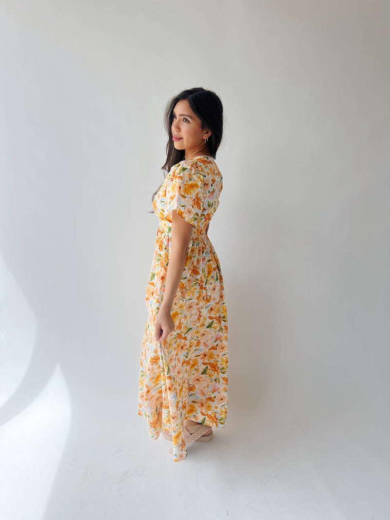 The Romero Floral Flutter Sleeve Maxi Dress in Yellow Multi
