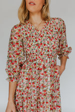 The Wolters Smocked V-Neck Floral Midi Dress in Ivory Multi