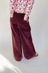 The Dorsey Corduroy Pin Tuck Wide Leg Pant in Burgundy