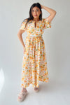 The Romero Floral Flutter Sleeve Maxi Dress in Yellow Multi