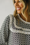 The Kensett Ruffle Trim Detail Blouse in Black